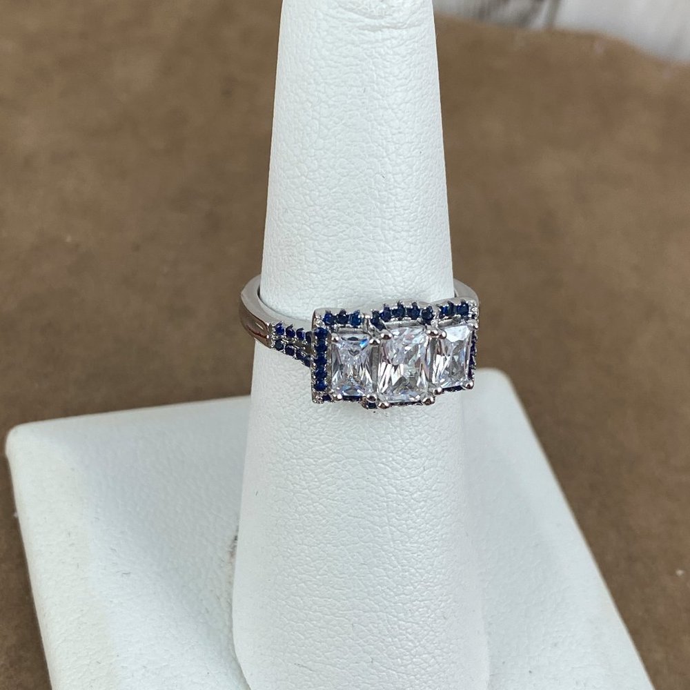 White Topaz 6x4MM Center with 5x3MM sides Radiant Cut With Blue Sapphires Size 6